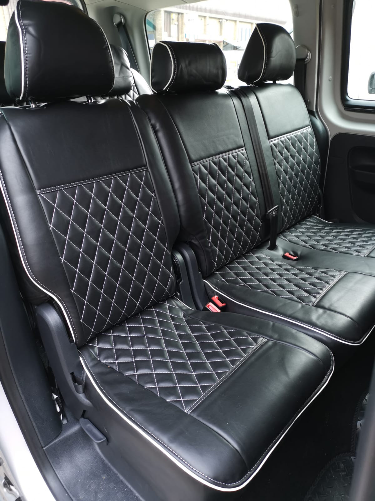 Seat covers being fitted in an AutoLeathers workshop