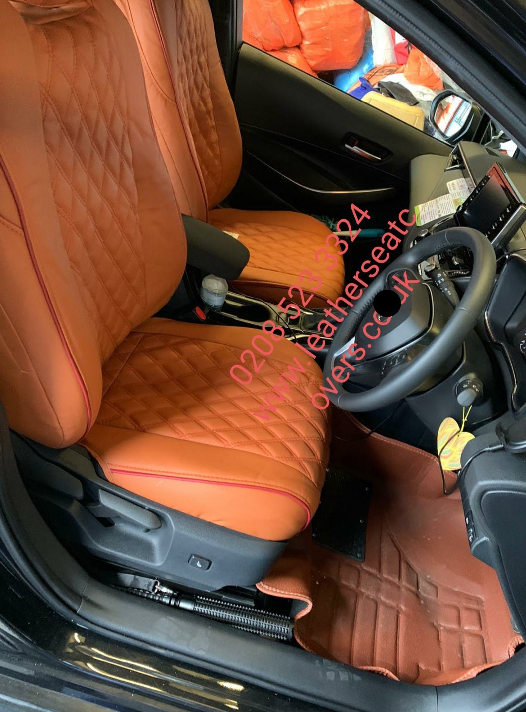Seat covers being fitted in an AutoLeathers workshop