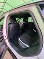 AutoLeathers custom-fit leather seat covers fitted to a 5-seater rear bench, rear door open